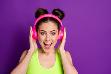 Fototapeta premium Close-up portrait of nice attractive glad cheerful girl fan listening favorite single chart stereo isolated over bright violet color background