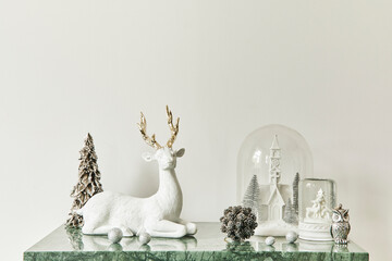 Christmas composition with beautiful decoration, christmas tree and wreath, deer, gifts and...