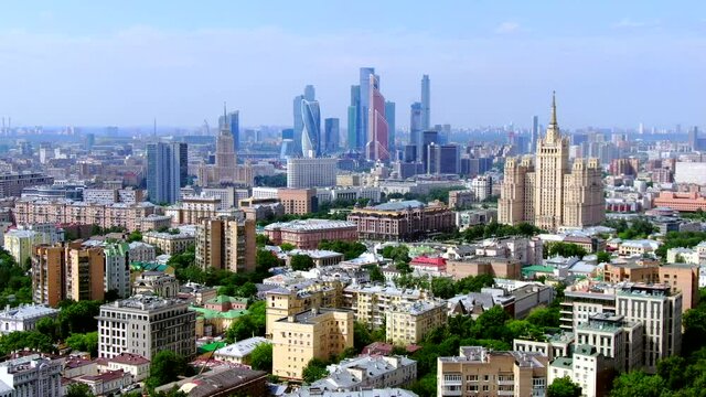 Moscow, Russia. Aerial panoramic view of the downtown, soviet high-rise buildings and Moscow city skyscrapers Drone flying over the amazing cityscape.