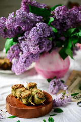 sausage rolls in zucchini on skewers.style rustic