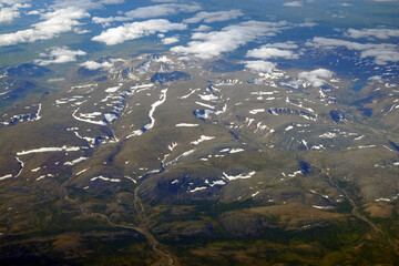 View at Polar Ural mountains from airplane. Yamalo-Nenets Autonomous Okrug (Yamal), Russia.