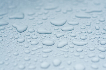 drops of water on a flat surface