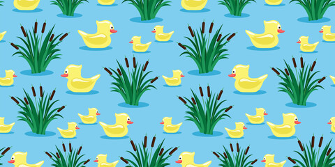 Fototapeta premium Seamless pattern with toy ducks and reeds on a blue background.