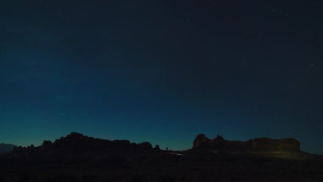timelapse of stars of a desert at night