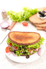 sandwich with lettuce, hma and cheese