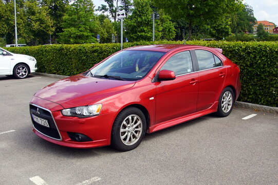 V&auml;xj&ouml;, Sm&aring;land, Sweden - July 29, 2019: Mitsubishi Lancer Sportback parked on a public parking lot. Nobody in the vehicle.