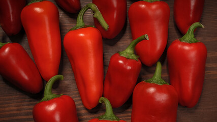 Close up chillies or peppers and capsicums or bell peppers. sweet bell, paprika, cayenne, chilli, hungarian wax pepper, isolated on wooden table background. 