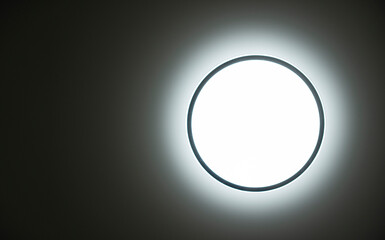 Round led ceiling lamp background. Saving lighting. Copy space.