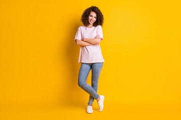 Full body portrait of young confident happy smile woman crossed hands isolated over yellow color background