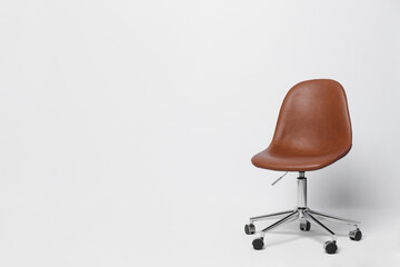 Comfortable office chair on white background, space for text