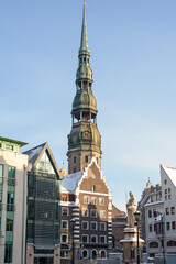 Fototapeta na wymiar Spire of St. Peter's Church in the center of Old Riga