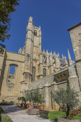 Garden Archbishop's cathedral - lovely small French-style public garden located in heart of city, is privileged promenade for Narbonne residents and tourists. Narbonne, France.