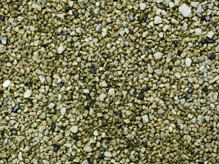 pile of wet white stone on the floor of walkway