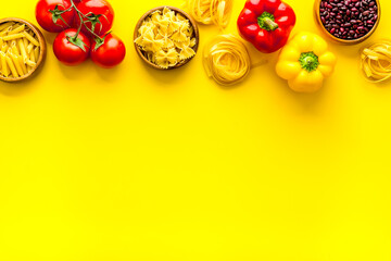 Selection of healthy food - vegetables, beans and herbs. View from above