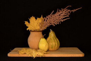 Autumn still life on a black background