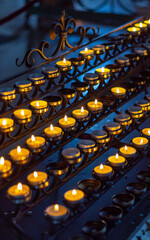 Obraz premium burning candles in church