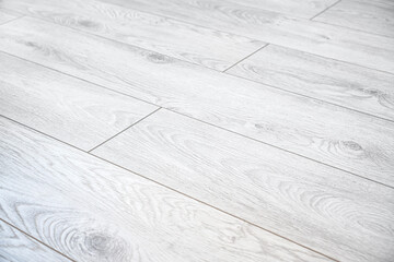 A white wooden laminate floor background