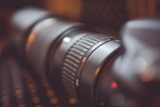 Closeup of a black camera zoom lens