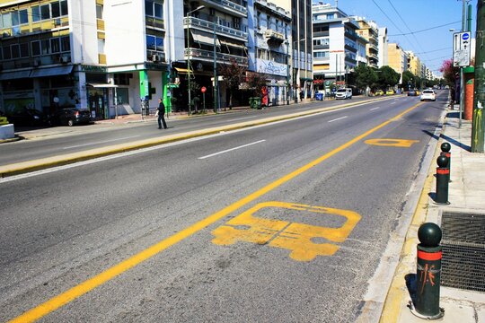 Empty Suggrou Avenue, one of the most crowded streets of Athens due to Coronavirus quarantine measures - Athens, Greece, March 21 2020.