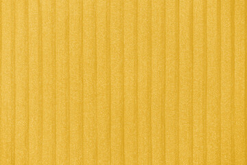 Fototapeta premium Plisse background. geometric cloth lines. Fabric, textile close up, toned in Fortuna Gold, colour 2021.
