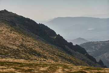 La Maliciosa, La Bola del Mundo, Navacerrada, La Pedriza, El Yelmo and the oak forests in autumn in the Sierra de Guadarrama National Park. Madrid's community. Spain