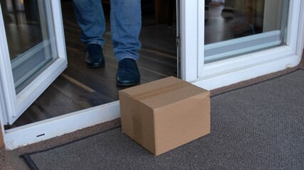 Picking Up a Package in Protective Blue Gloves In Epidemic Virus Times POV