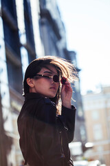 Fototapeta premium young pretty asian girl outside on big city street, lifestyle people concept