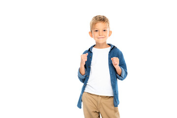 Smiling boy showing yeah gesture isolated on white © LIGHTFIELD STUDIOS