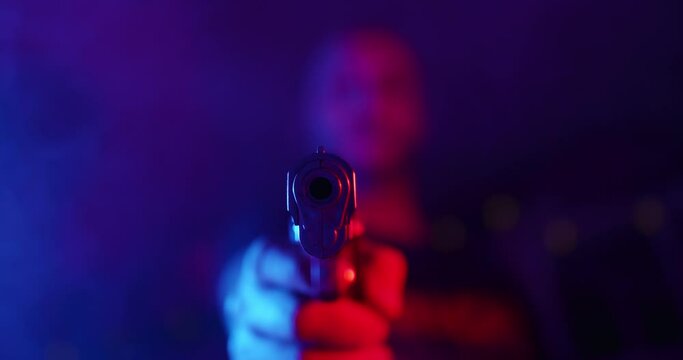 Criminal pointing gun to camera