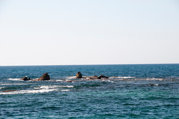 View of the sea and rocks on a warm spring day. Mediterranean Sea