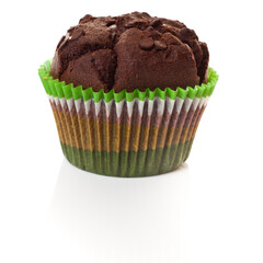 Chocolate chip muffin/cupcake in a color striped mould. Studio photo isolated on white.