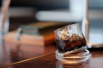 A glass of ice black coffee in coffee cafe