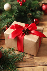 Fototapeta na wymiar Christmas gift box on wooden table, closeup