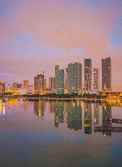country skyline at sunrise downtown Miami Florida reflections buildings  sky colors cityscape beautiful 