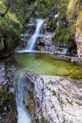 Fototapeta premium Landscape and waterfall at Cadini del Brenton - Sospirolo - Italy