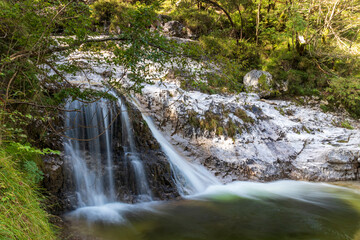 Obraz premium Landscape and waterfall at Cadini del Brenton - Sospirolo - Italy