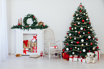 Christmas interior of the Christmas tree pine new year presents a postcard