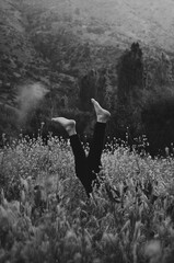 person in the forest back and white