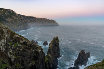 Fototapeta na wymiar sunset on the wild rocky coast of Galicia in northern Spain