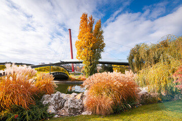 Autumn landscape of Drumul Taberei Park in Bucharest city capital of Romania with cloudy sky and...