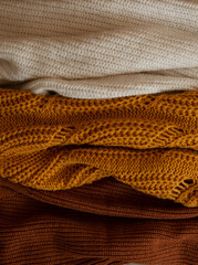 Texture of differnets knitted sweaters
