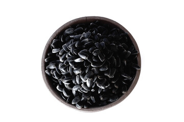 Sunflower seeds in a plate on a white background