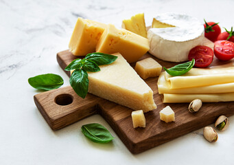 Various types of cheese and snacks