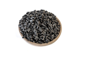 Sunflower seeds in a plate on a white background