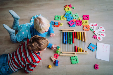 kids learning numbers, counting and abacus calculation