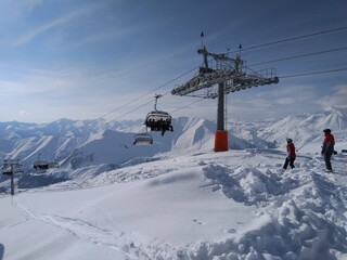 Fototapeta na wymiar lift in the mountains in the ski resort of Gudauri in Georgia