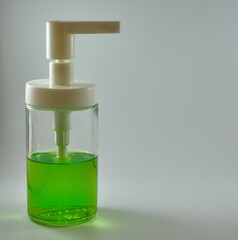 Alcohol gel sanitazer liquid cleaning hands for prevent corona virus covid-19 closeup.