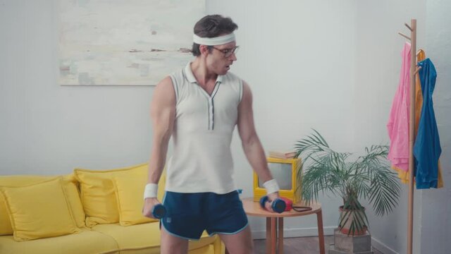 Sportsman squatting, while lifting weight at home, retro sport concept