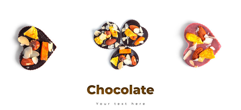 Raw heart shaped chocolate with dried fruits and nuts on a white background. High quality photo