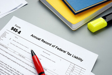 Business concept about Form 945-A Annual Record of Federal Tax Liability with inscription on the piece of paper.